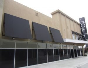 Black window awnings and commercial awnings for Loft