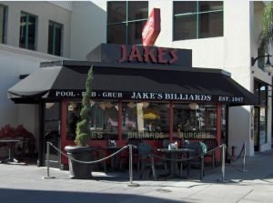 Black and red storefront awning for Jake's Billiards