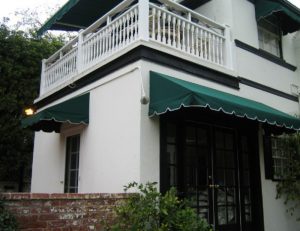 Custom green and white commercial awnings