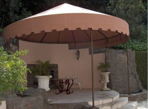 Patio shade awning with rust colored awning fabric