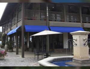 Blue commercial awning for a restaurant