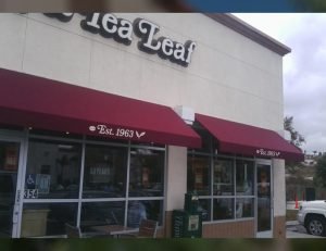 Red commercial awnings for The Coffee Bean