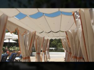 Commercial slide on wire awning and custom drapes