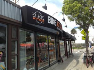 Black storefront awnings for Bike Attack