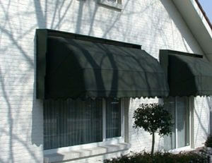 Forrest green awning fabric on custom residential awnings