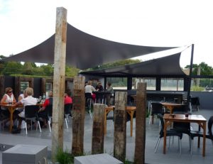 Grey sun shade panels for an outdoor area