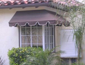 Custom residential window awning with brown awning fabric