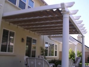 White trellis cover with dark slide waire awning fabric