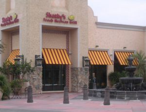 Striped red and yellow commercial awnings