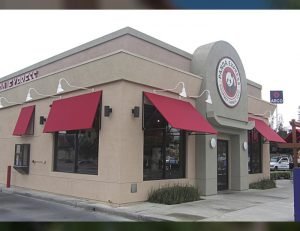 Red commercial window awnings for Panda Express