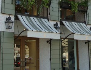 Custom window awnings with striped awning fabric