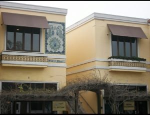 Custom window awnings with brown awning fabric