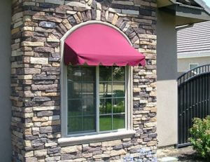 Residential window awning with red awning fabric