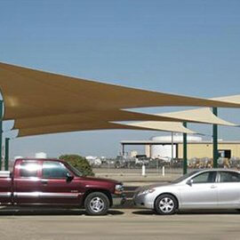 Custom sail panel offering shade in a parking lot