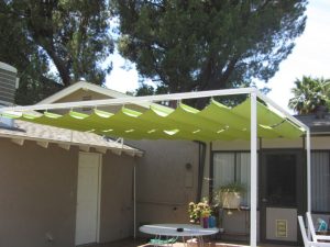 Slide on wire awning with lime green awning fabric