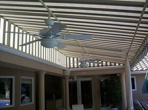 Custom patio shade awning with white and green striped awning fabric