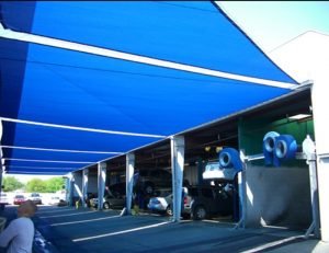 Commercial sun shade panel with blue awning fabric
