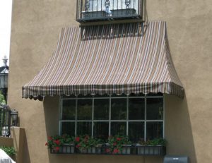 Custom striped residential window awning