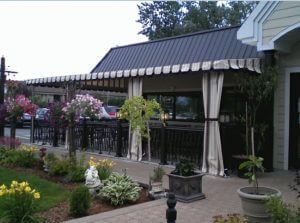 Commercial patio shade awning with custom white and olive awning fabric