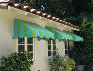 Blue and green residential window awnings