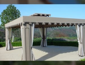 Custom cabana with dark grey awning fabric and custom drapes