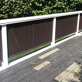 Dark fabric covers for a deck
