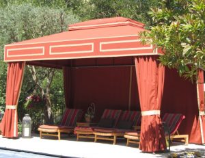Custom cabana with orange awning fabric