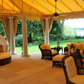 Beautiful metal awning with yellow fabric over an outdoor patio