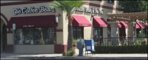 Red window canopy for The Coffee Bean